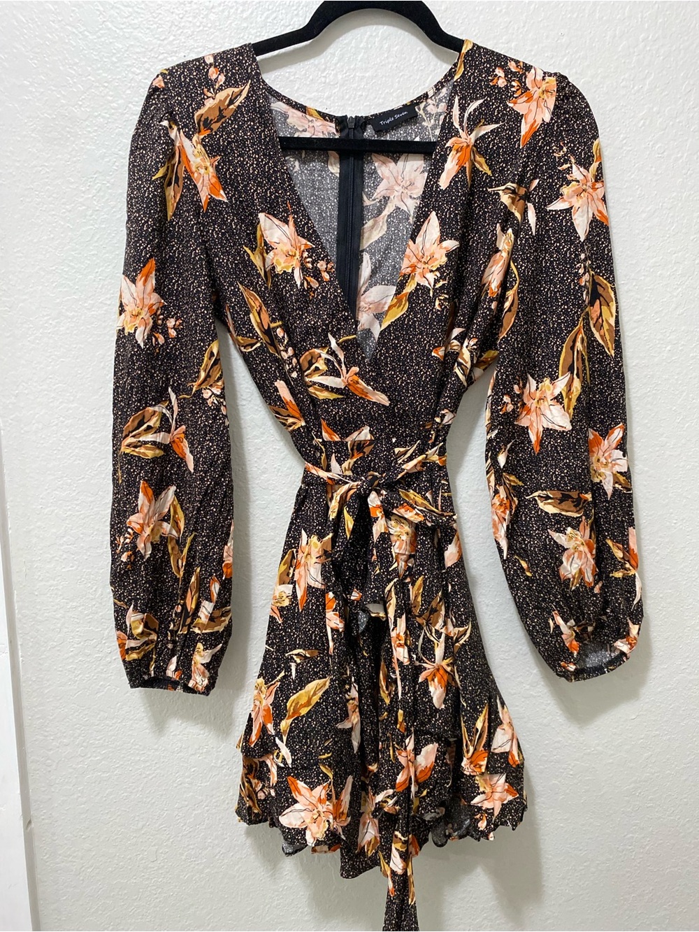 Floral V-Neck Wrap Romper in Black with Orange Floral Print